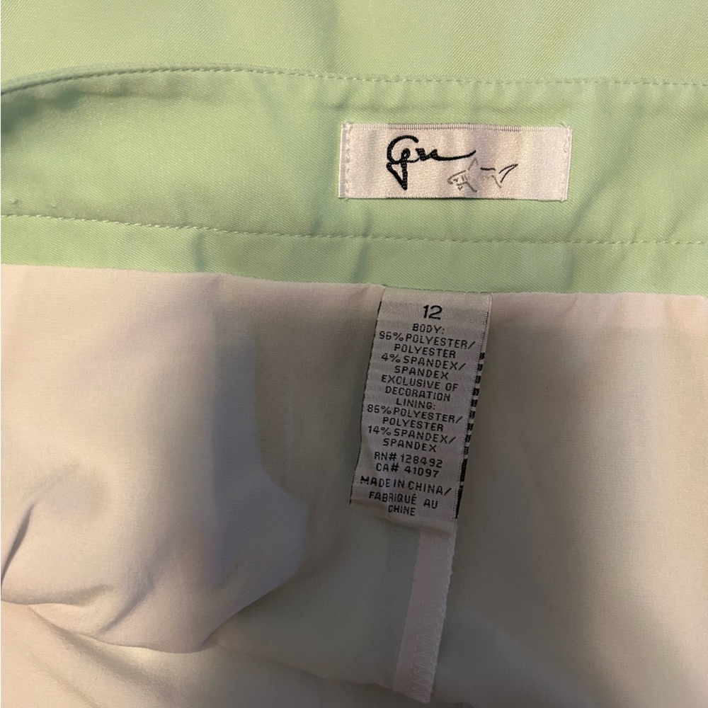 Ladies Greg Norman golf skort with matching top